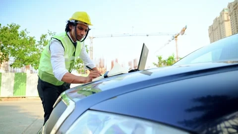 An engineer taking notes writing Stock Footage 277036148