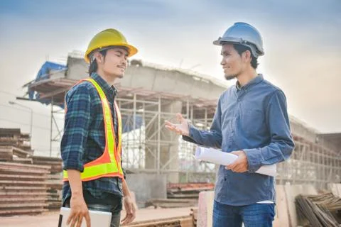 Engineer talking with Foreman  Construction site background architecture prof Stock Photos
