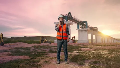 Engineer Talking On Smartphone at Construction Site Stock Footage 330332038