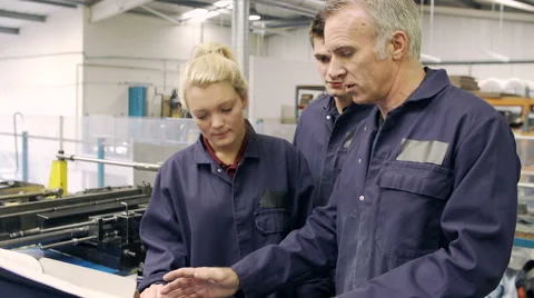 Engineer Teaching Apprentices To Use Tube Bending Machine Video stock 40430026