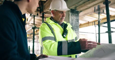 Engineer, team and blueprint at site for construction, inspection and planning Stock Footage 337039050