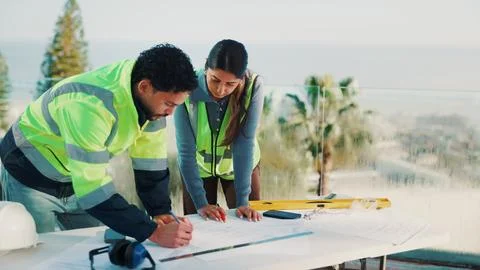 Engineer, team and drawing outdoor with blueprint, property development or .. Fotos de archivo