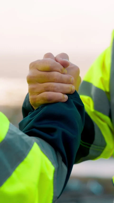 Engineer, team and handshake for construction with collaboration, renovation or Stock Footage 336206190