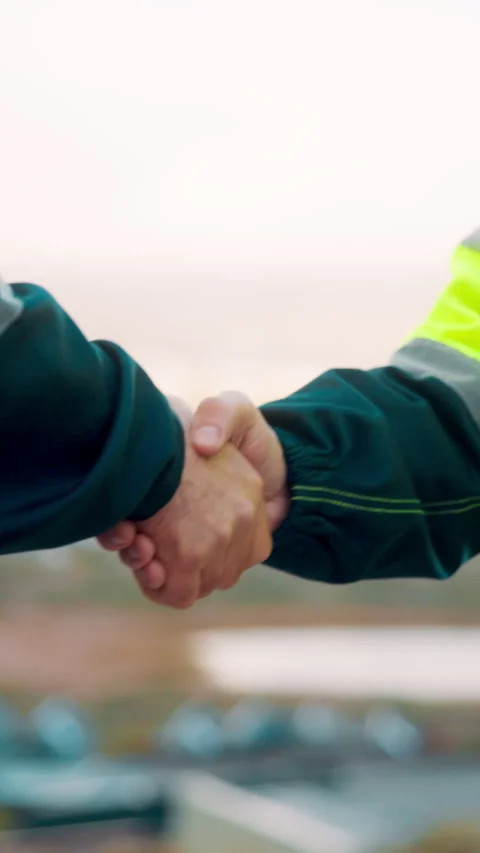 Engineer, team and shake hands for construction with collaboration, renovation Stock Footage 336216775