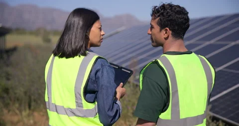 Engineer, team and solar panel in nature with tablet, research and inspection Stock Footage 348717808
