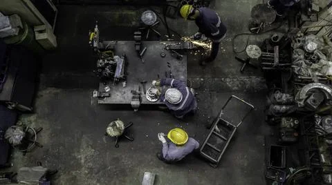 Engineer team are working in workshop room, Technician are fixing and repairi Stock Photos