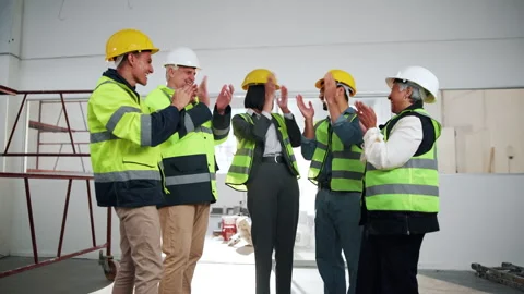 Engineer, team building and stack hands for success, clapping or celebration for Stock Footage 341590312