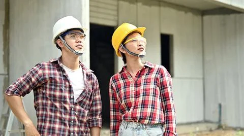 Engineer team discuss and working at construction property site. Inspection a Фото