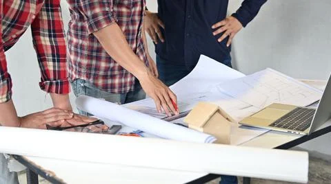 Engineer team discuss and working at construction property site. Inspection a Фото