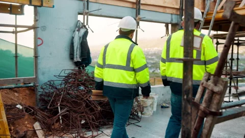 Engineer, team or walking on construction site for planning, inspection or urban Stock Footage 336193351