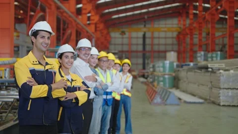 Engineer team standing with arms crossed and confidence in factory. Teamwork Видео 237004702