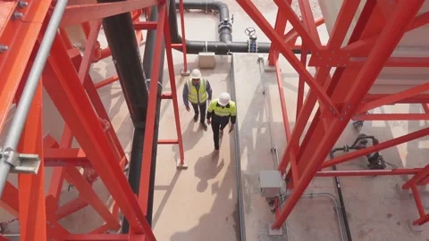 Engineer team use tablet technology to plan and monitor water systems. Video stock 238432781