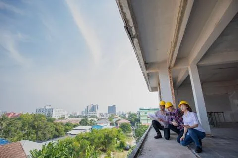 Engineer team working in construction site Stock Photos