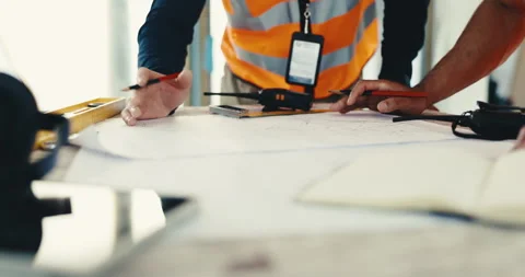 Engineer, teamwork and hands with blueprint, sketch and ideas for property Stock Footage 344922308