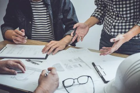 Engineer Teamwork Meeting, Drawing working on blueprint meeting for project w Stock Photos