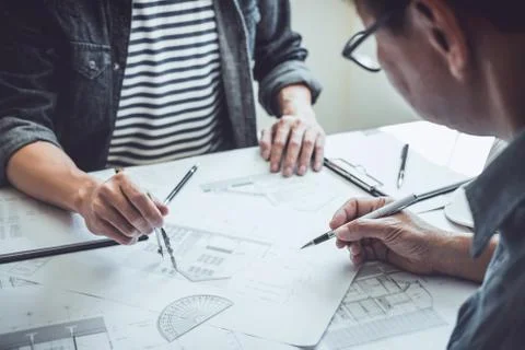 Engineer Teamwork Meeting, Drawing working on blueprint meeting for project w Stock Photos