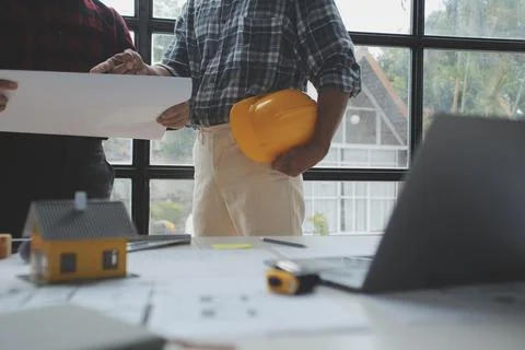 Engineer Teamwork Meeting, Drawing working on blueprint meeting for project.. Stock Photos