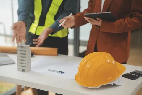 Engineer Teamwork Meeting, Drawing working on blueprint meeting for project.. Stock Photos