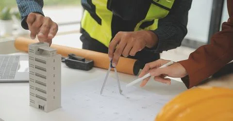 Engineer Teamwork Meeting, Drawing working on blueprint meeting for project.. Stock Photos