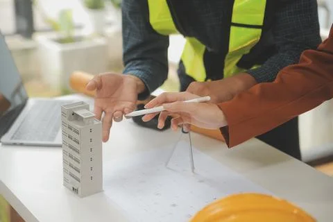 Engineer Teamwork Meeting, Drawing working on blueprint meeting for project.. Stock Photos
