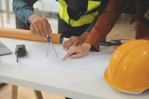Engineer Teamwork Meeting, Drawing working on blueprint meeting for project.. Stock Photos
