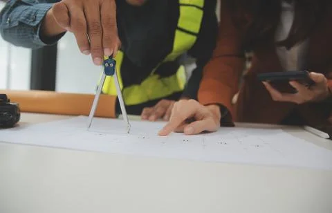 Engineer Teamwork Meeting, Drawing working on blueprint meeting for project.. Stock Photos