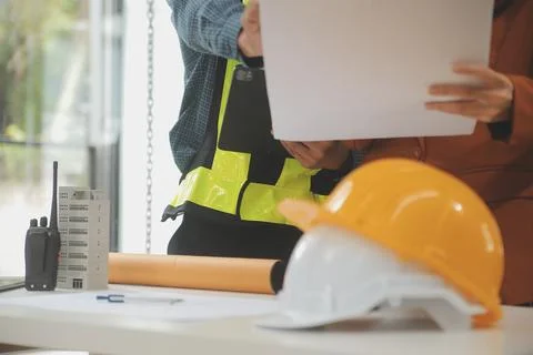Engineer Teamwork Meeting, Drawing working on blueprint meeting for project.. Stock Photos