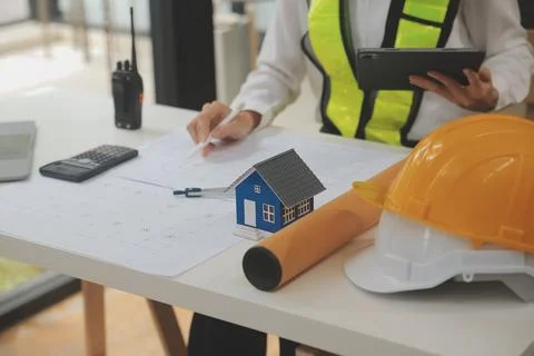 Engineer Teamwork Meeting, Drawing working on blueprint meeting for project.. Stock Photos