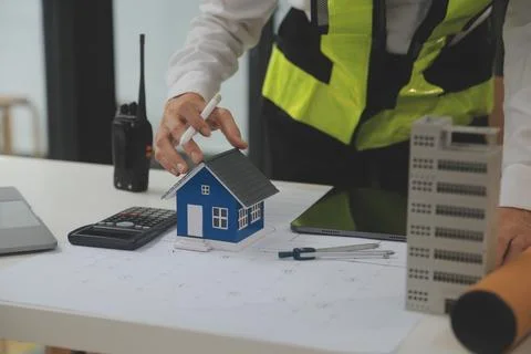 Engineer Teamwork Meeting, Drawing working on blueprint meeting for project.. Stock Photos