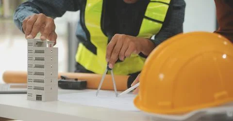 Engineer Teamwork Meeting, Drawing working on blueprint meeting for project.. Stock Photos