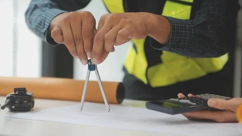 Engineer Teamwork Meeting, Drawing working on blueprint meeting for project.. Stock Photos