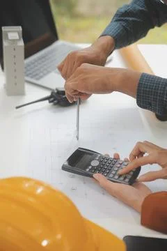 Engineer Teamwork Meeting, Drawing working on blueprint meeting for project.. Stock Photos