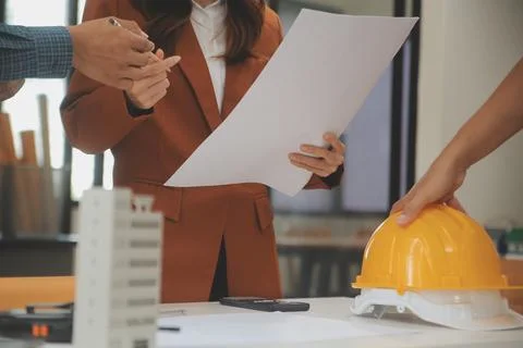 Engineer Teamwork Meeting, Drawing working on blueprint meeting for project.. Stock Photos