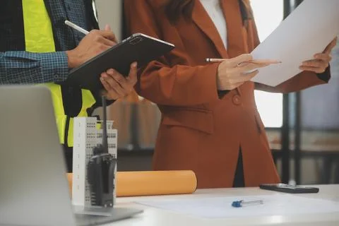 Engineer Teamwork Meeting, Drawing working on blueprint meeting for project.. Stock Photos