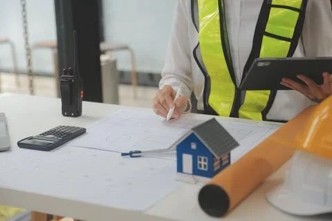Engineer Teamwork Meeting, Drawing working on blueprint meeting for project.. Stock Photos