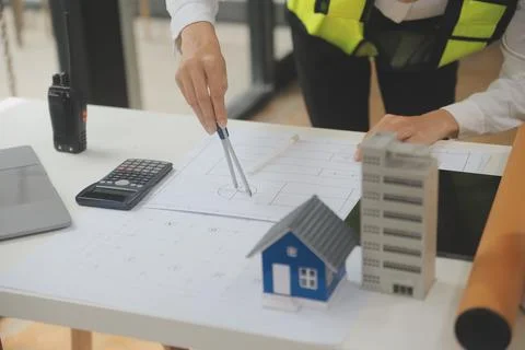 Engineer Teamwork Meeting, Drawing working on blueprint meeting for project.. Stock Photos