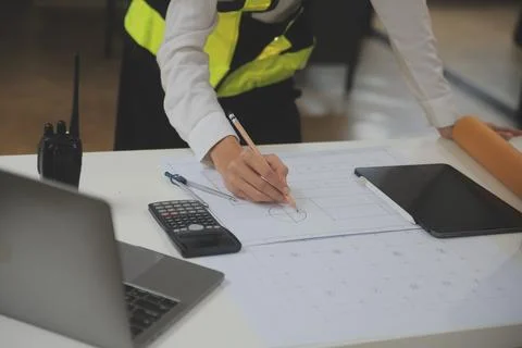 Engineer Teamwork Meeting, Drawing working on blueprint meeting for project.. Stock Photos