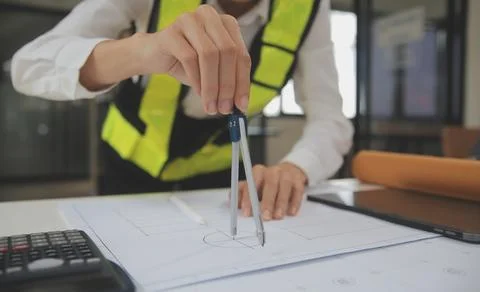 Engineer Teamwork Meeting, Drawing working on blueprint meeting for project.. Stock Photos