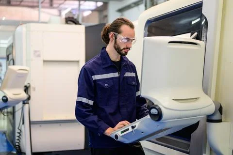 Engineer technician checking and repairing at industrial factory Stock Photos