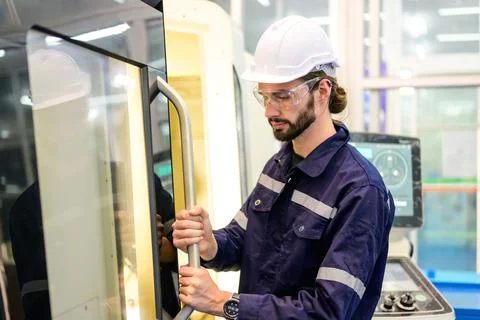 Engineer technician checking and repairing at industrial factory Stock Photos