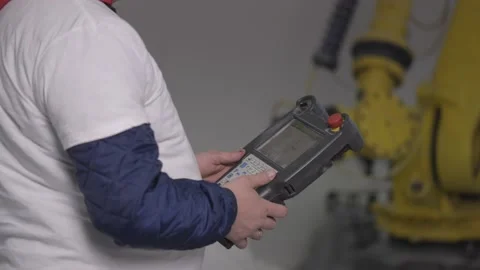 Engineer technician control manage robot arm with remote control Stock Footage 167938481