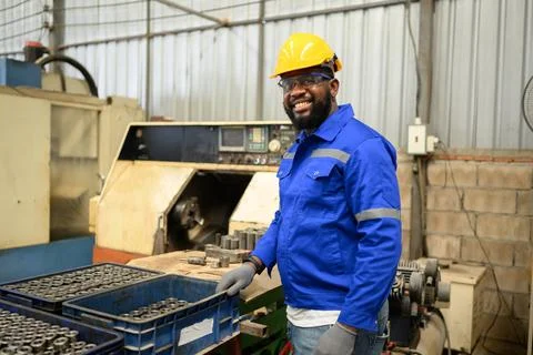 Engineer technician controlling robotic arms on computer laptop Stock Photos