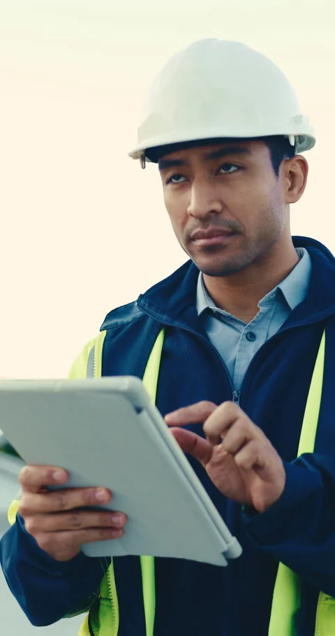 Engineer, thinking and man with tablet, outdoor and scroll research for property Stock Footage 345575114