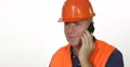 Engineer in Time of Working Program Talking Mobile Phone with Smiling Attitude 4k or 4k+ Resolution
