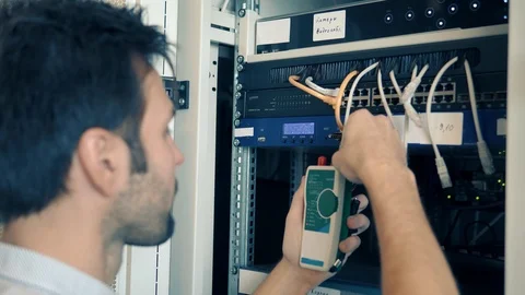 Engineer With Toolboxs Work In Server Room.Check And Fix Problem Of Network. Stockbeeldmateriaal 104178203