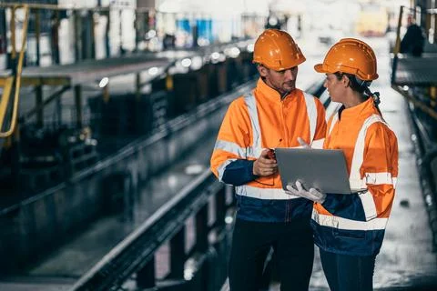 Engineer train engine service team man and women working together at train .. Stock Photos