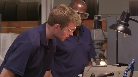 Engineer Training Male Apprentice On Lathe  스톡 동영상 72512444