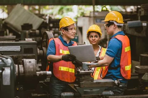 Engineer training talking technical explain to new employee and show inform.. Stock Photos