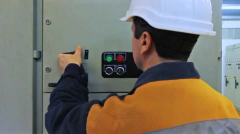 Engineer Turns On Equipment Closeup Video stock 10790353