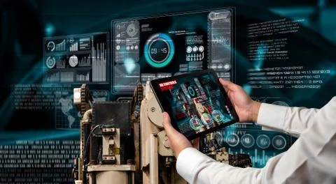 Engineer use augmented reality software in smart factory production line Stock Photos